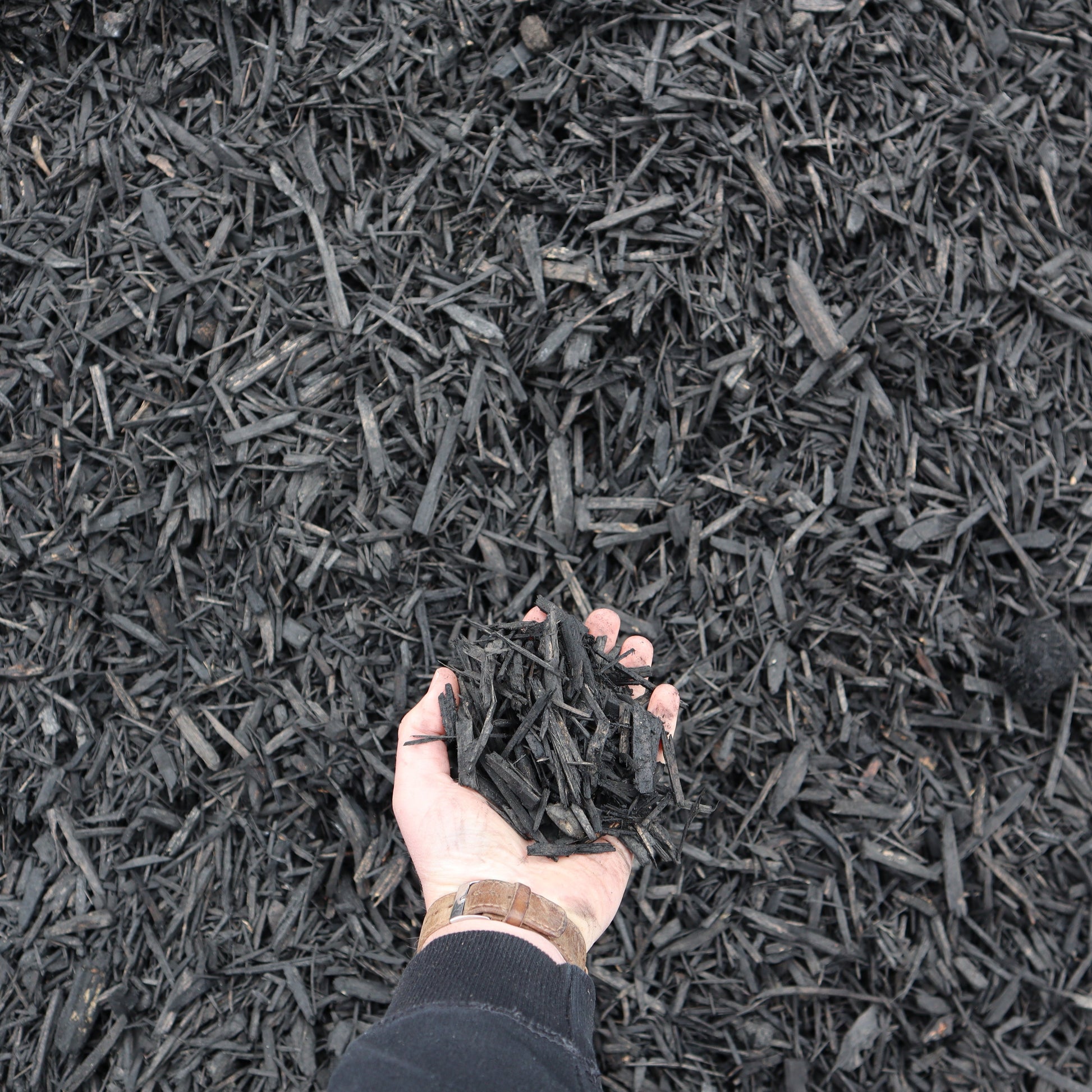 Black beauty bark mulch available via small dump truck load by Missoula Dirt Delivery
