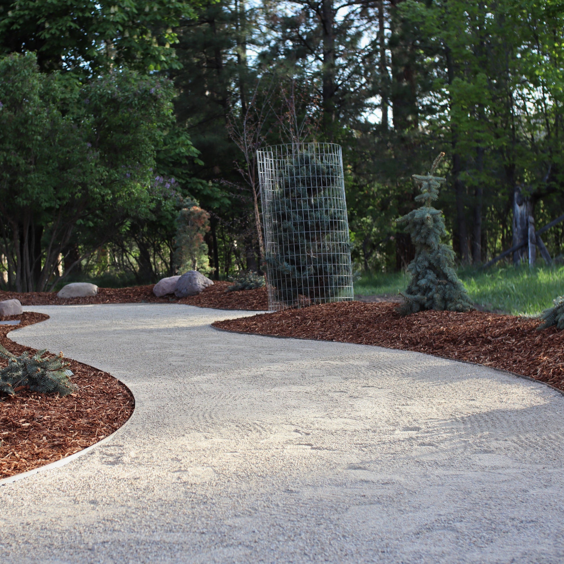 Lolo Crusher Fines gravel used as a pathway material in a landscape in Missoula.